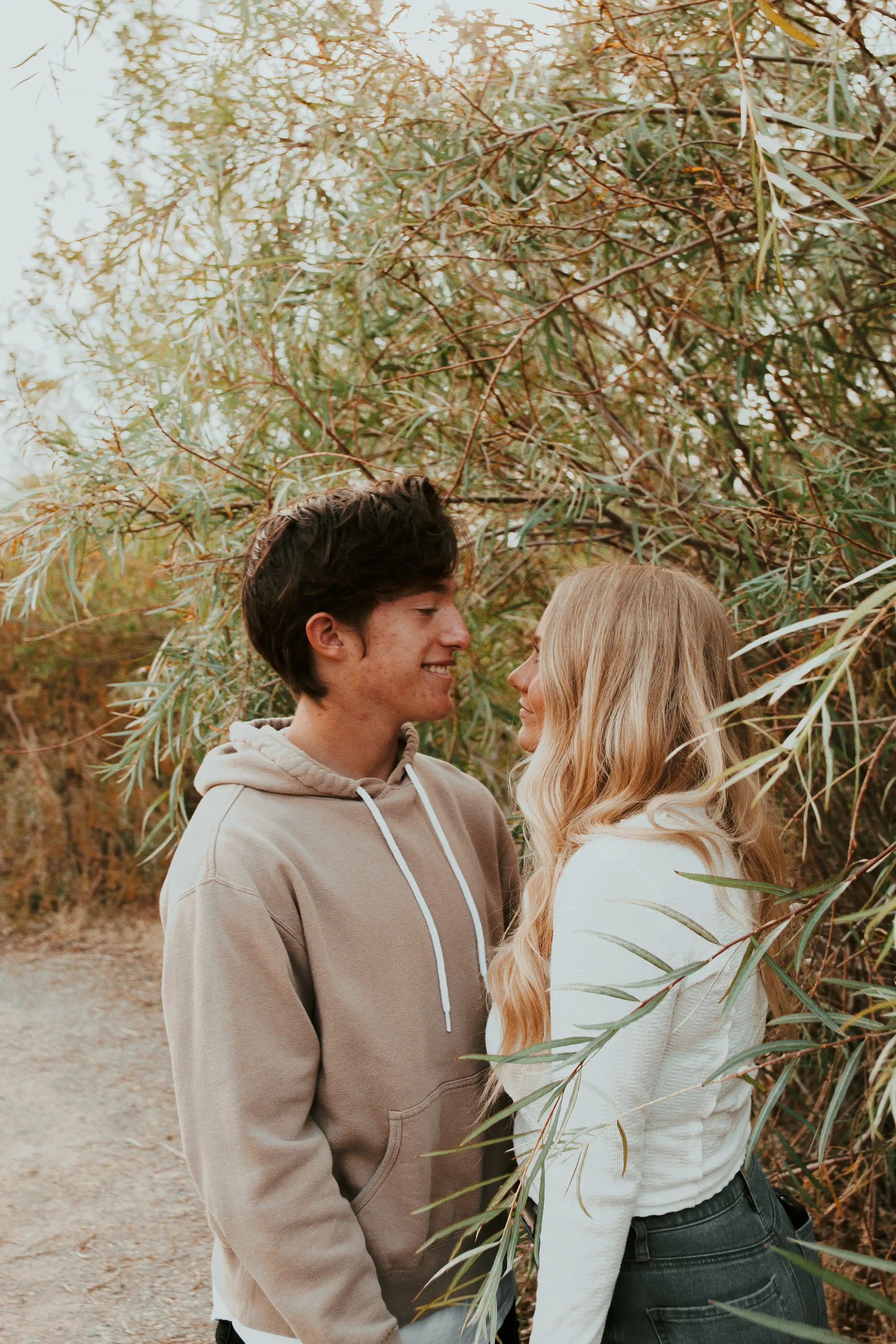 Brynelle and her boyfriend (Tate) holding hands and admiring each other